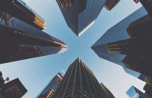 blue and black city buildings photography