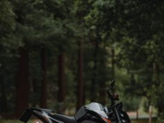 black and silver naked motorcycle on road during daytime