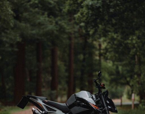 black and silver naked motorcycle on road during daytime