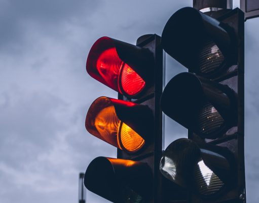 street traffic lights on red and orange
