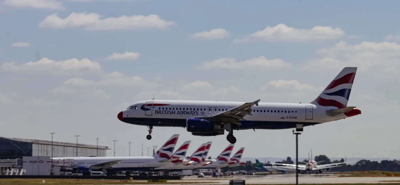 Heathrow Airport expansion construction plans with financial document showing £320 million cost recovery approval