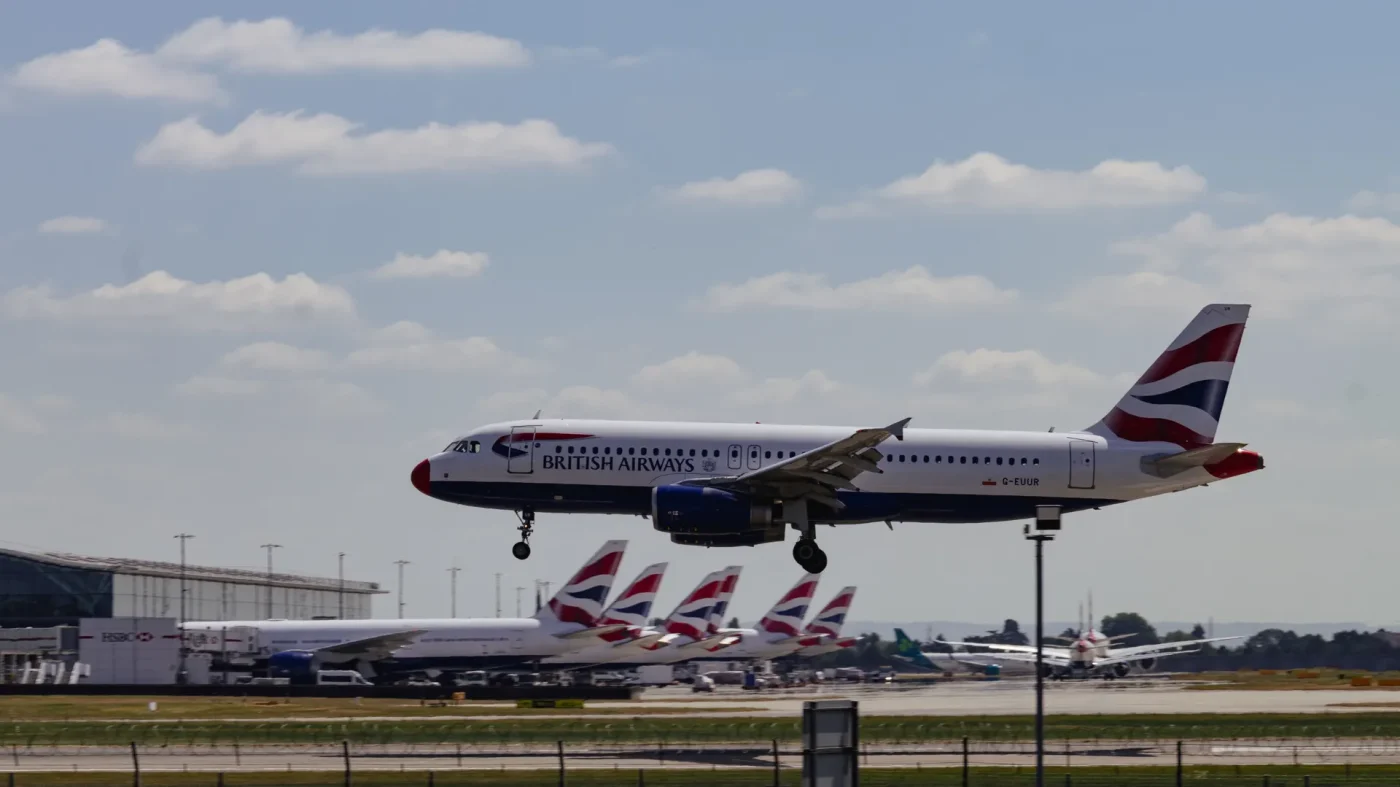 Heathrow Airport expansion construction plans with financial document showing £320 million cost recovery approval
